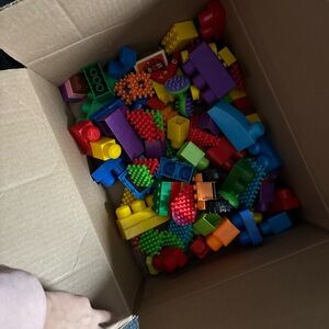 Box of kids duplo blocks and other blocks